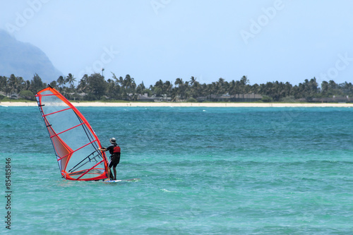 A windsurf on a tropical beach © lucadianaphoto