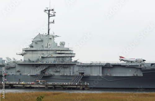 U.S. Military Ship –  U.S. military battle ship docked on shore  © dcorneli