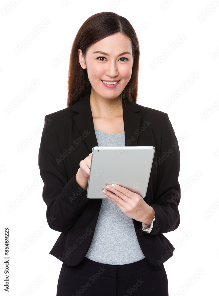Asian businesswoman use of digital tablet Asian businesswoman use of digital tablet