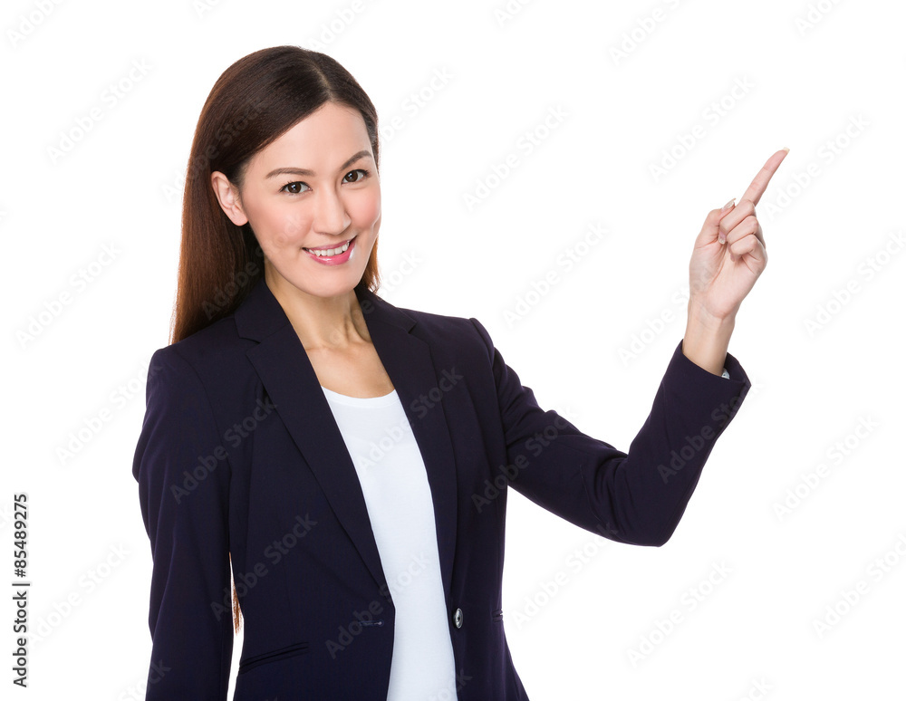 Asian businesswoman with finger showing up Asian businesswoman with finger showing up