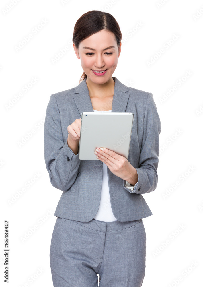Businesswoman use of digital tablet Businesswoman use of digital tablet