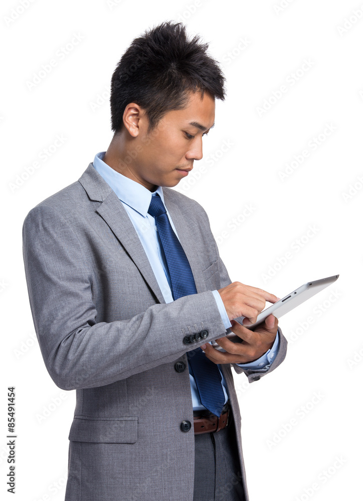 Asian businessman use of digital tablet Asian businessman use of digital tablet