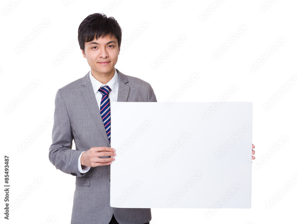 Businessman show with white banner Businessman show with white banner