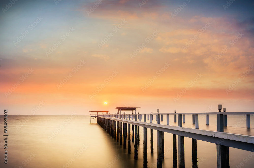 Landscape of Wooded bridge in the port between sunrise.