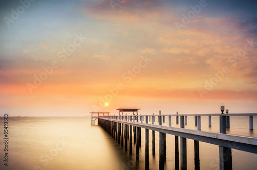 Landscape of Wooded bridge in the port between sunrise.