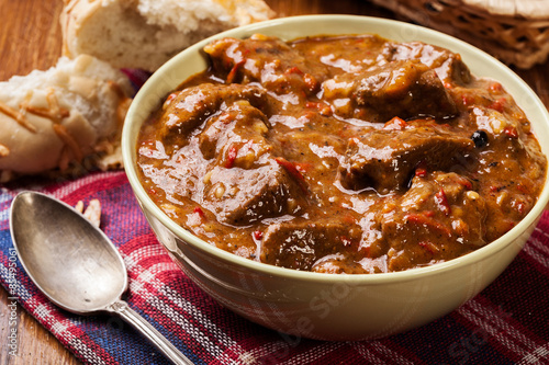 Beef stew served with crusty bread