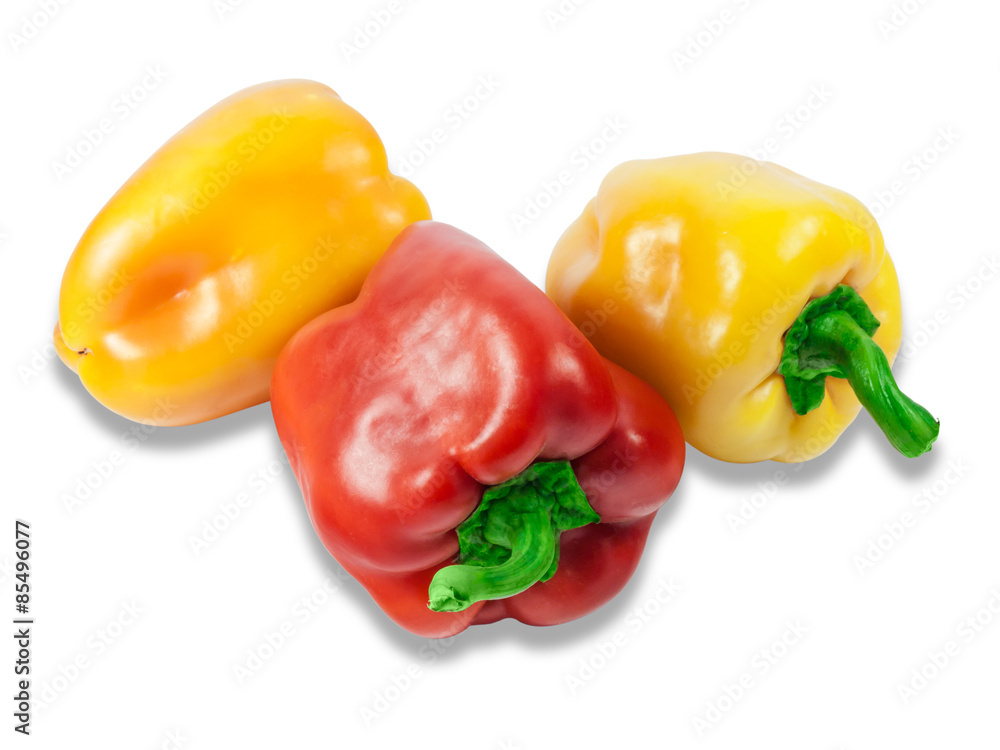 Two yellow and red bell peppers Two yellow and red bell peppers
