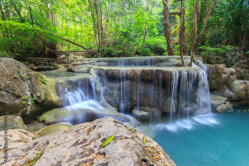 Deep forest waterfall at Erawan waterfall National Park Kanchanaburi Thailand