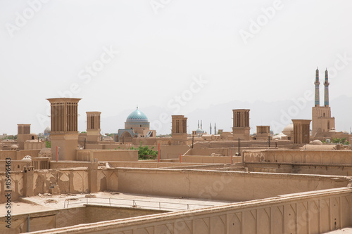 Panoramic view of badgirs and mosques of Yazd, Iran photo