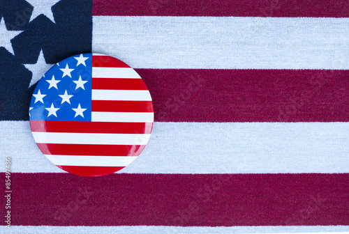 Patriotic holiday 4th of july: badge over American flag