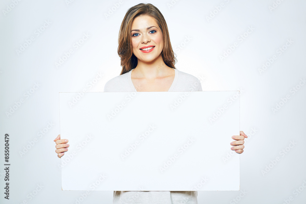 smiling woman holding white sign board. smiling woman holding white sign board.