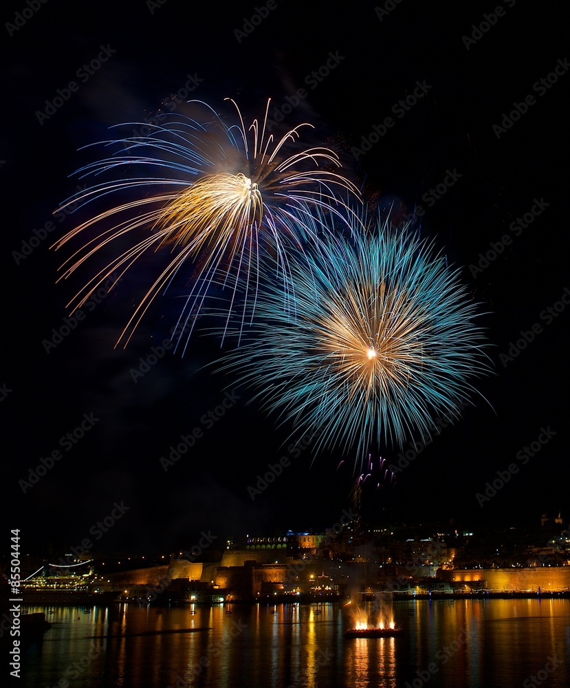 Blue fireworks in dark sky background on 4 of July