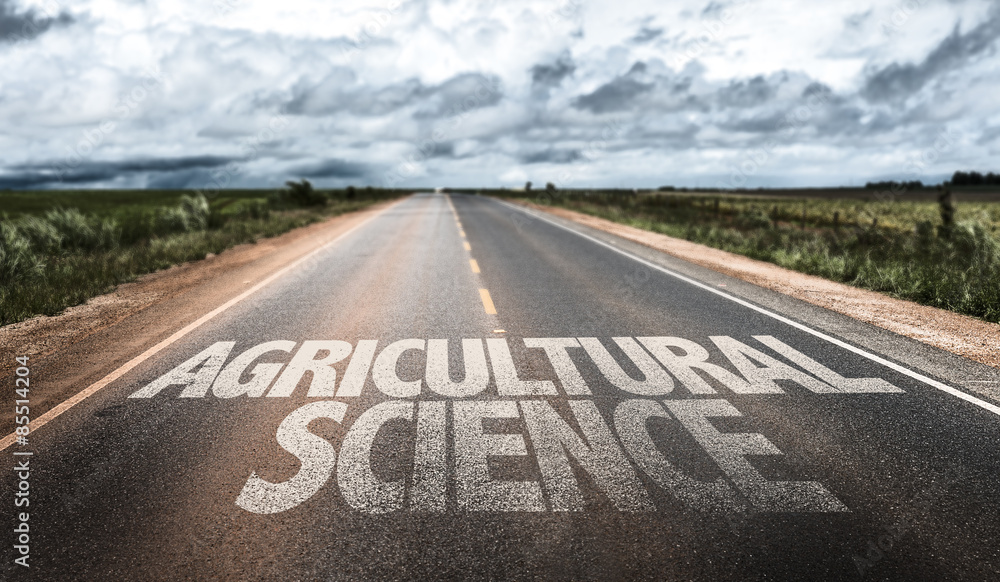 Naklejka premium Agricultural Science written on rural road