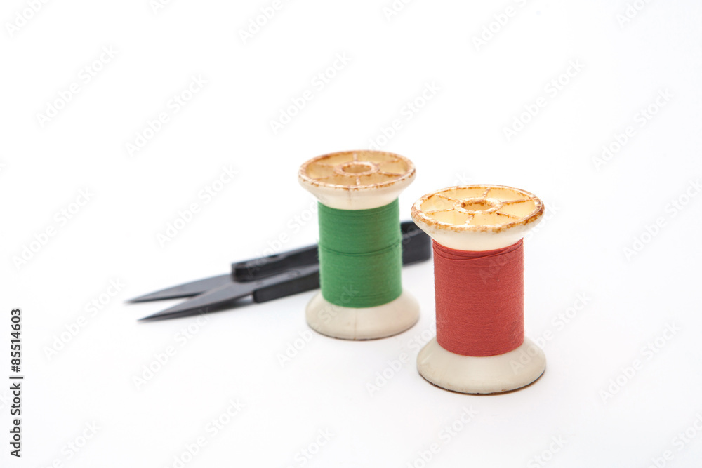 spool of thread on white background spool of thread on white background