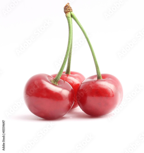 juicy cherries isolated on white