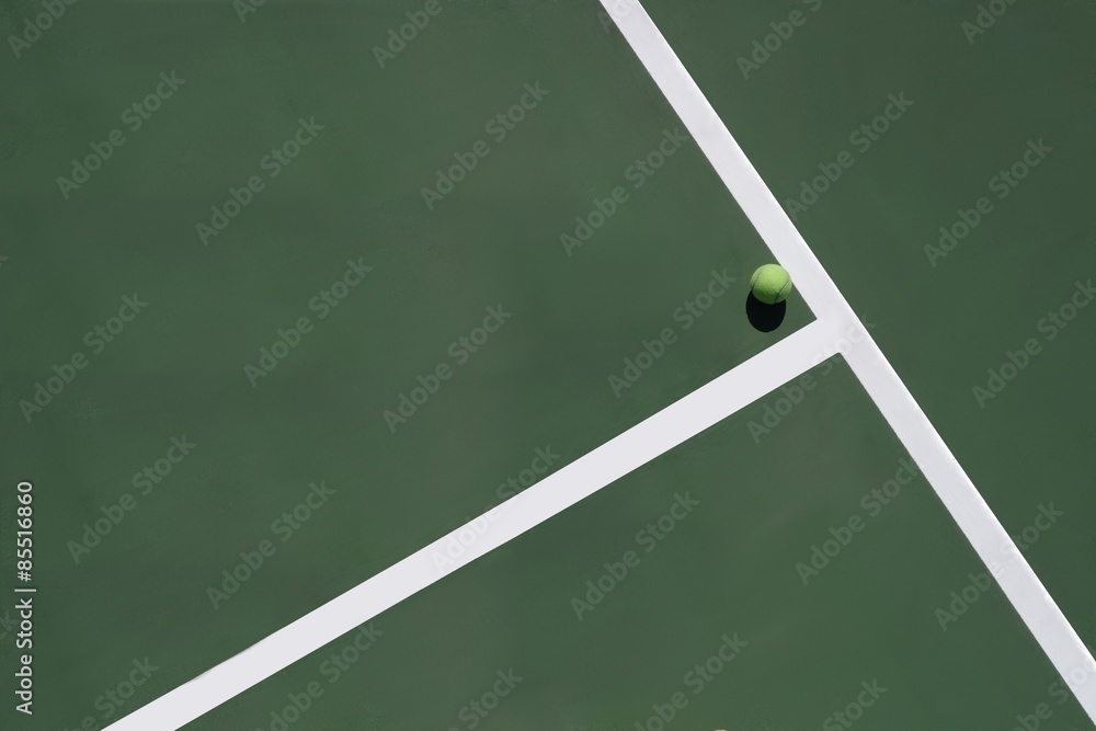 tennis ball at corner of service box with space for your posting or ad