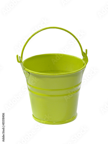 Empty green bucket taken closeup.Isolated.