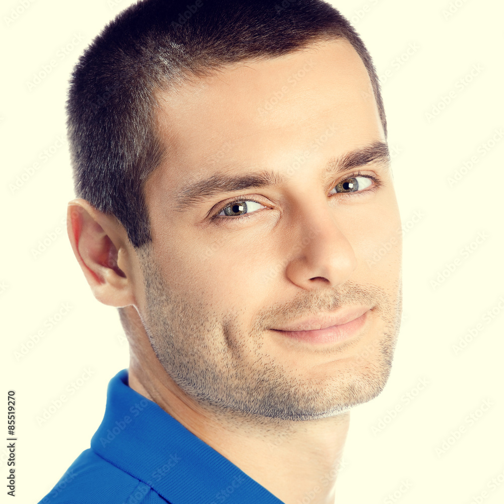 Obraz premium Portrait of cheerful young man, looking at camera