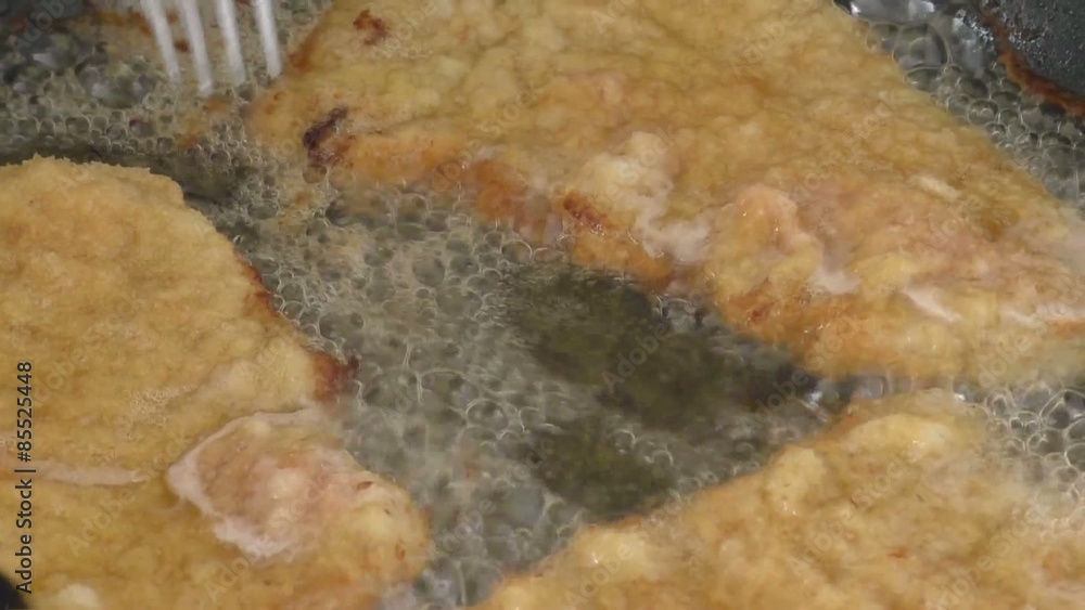 Fry chops in oil in a frying pan
Fry chops in oil in a frying pan