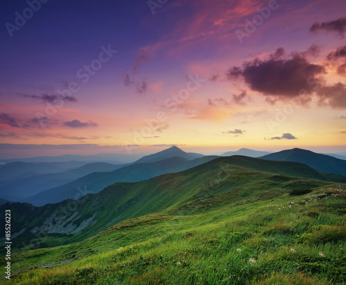 Mountain valley during sunrise. Natural summer landscape.