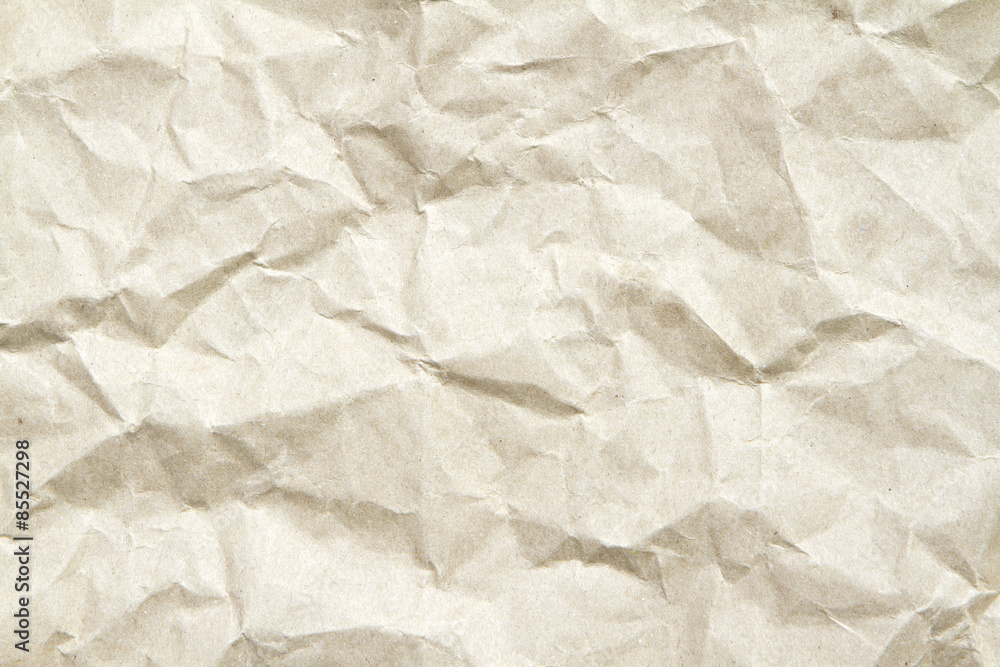 Obraz premium Light brown creased paper background texture