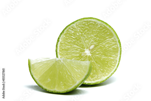  Limes with leaves isolated on white background
