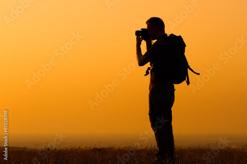 Hiker photographing
