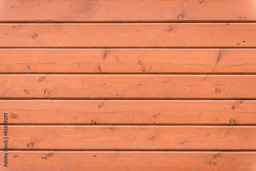 Wooden texture of brown color with scratches and cracks, which can be used as a background Wooden texture of brown color with scratches and cracks, which can be used as a background