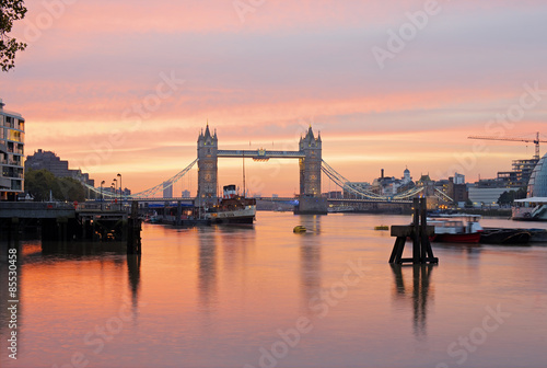 Famous Tower Bridge in front of colorful sky at morning before sunrise, London, England, United Kingdom 