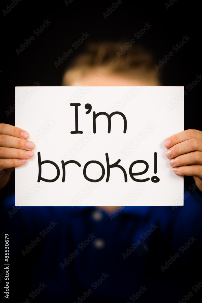 Person holding I am broke sign Person holding I am broke sign