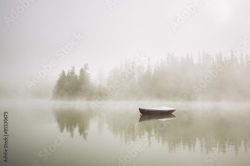 Obraz na plátně Boat in mysterious fog