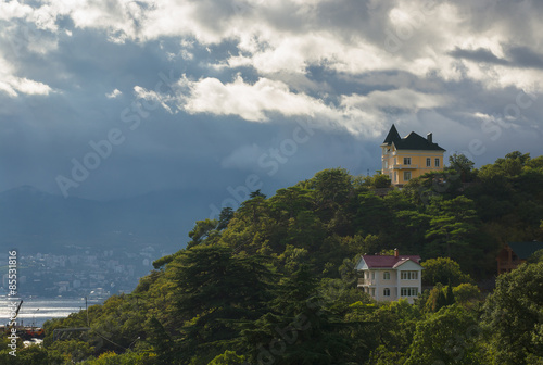 Wallpaper Mural Landscape with pre-stormy sky and houses on the hill in Crimean Mountains Torontodigital.ca