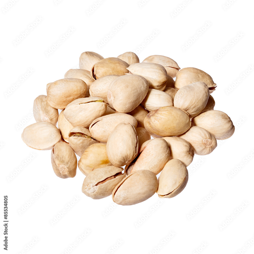 Pistachios heap isolated on white background.