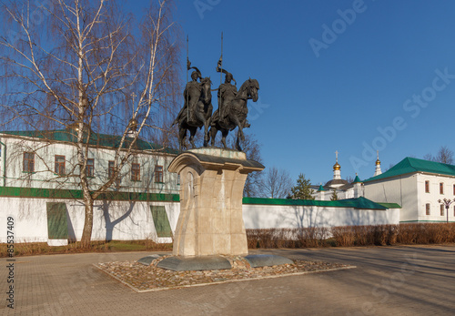 Sculptural monument Holy Prince Boris and Gleb in the background Borisoglebsky Monastery in Dmitrov