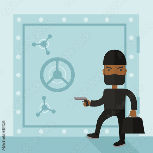 Man in black hacking bank safe.