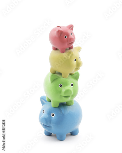 Stack of colorful piggy banks. Energy saving concept.