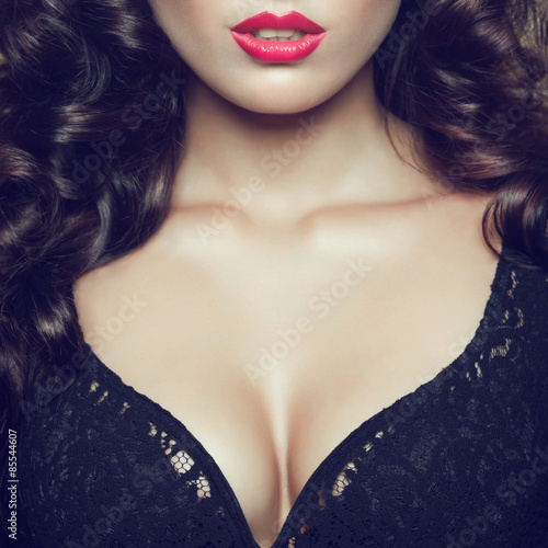 Seductive decollete concept. Portrait of beautiful brunette.