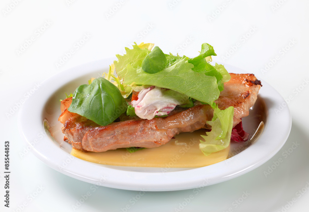 Fried pork belly with leaf vegetables