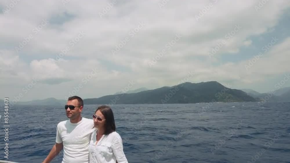 Couple of lovers walk on a yacht on the high seas. RAW video Couple of lovers walk on a yacht on the high seas. RAW video