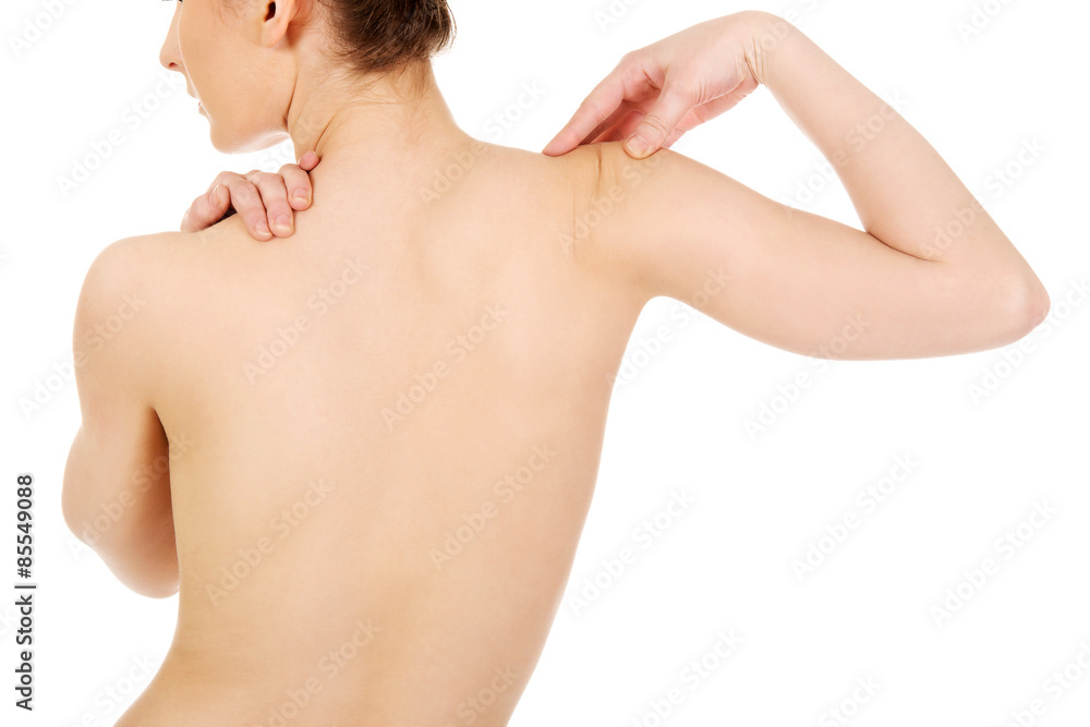 Naklejka premium Naked woman's spine.