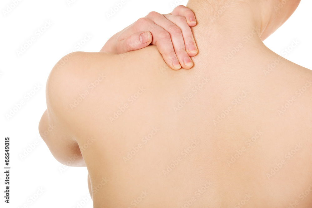 Woman holding her neck. Woman holding her neck.