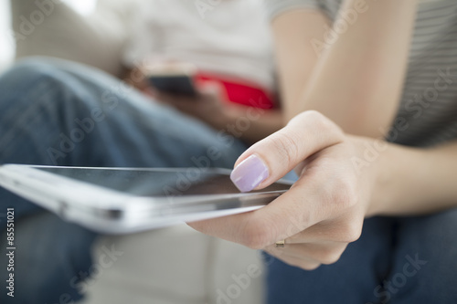 Woman looking at smartphone