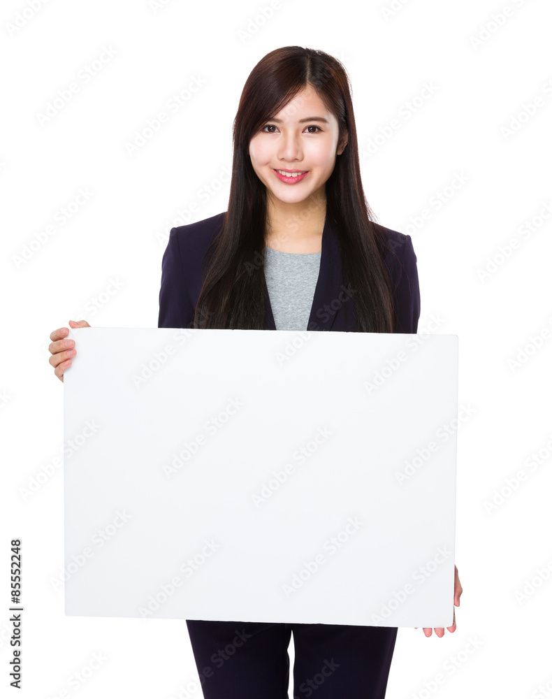 Young businesswoman show with white banner Young businesswoman show with white banner