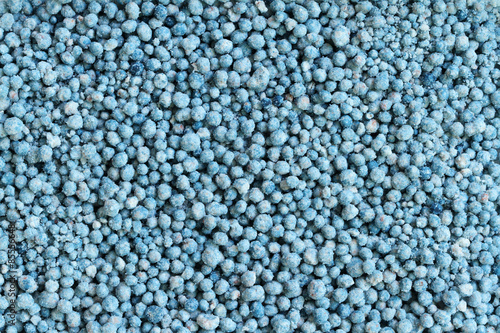 Blue fertilizer texture background