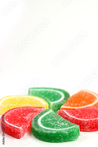 Colorful assorted candy on white background