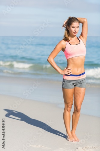 Fit woman standing beside the sea  © WavebreakmediaMicro