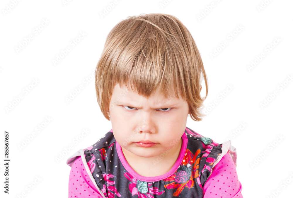 Cute Caucasian blond baby girl angry frowns Cute Caucasian blond baby girl angry frowns