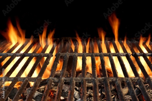 BBQ Grill With Flaming Charcoal Isolated On Black Background