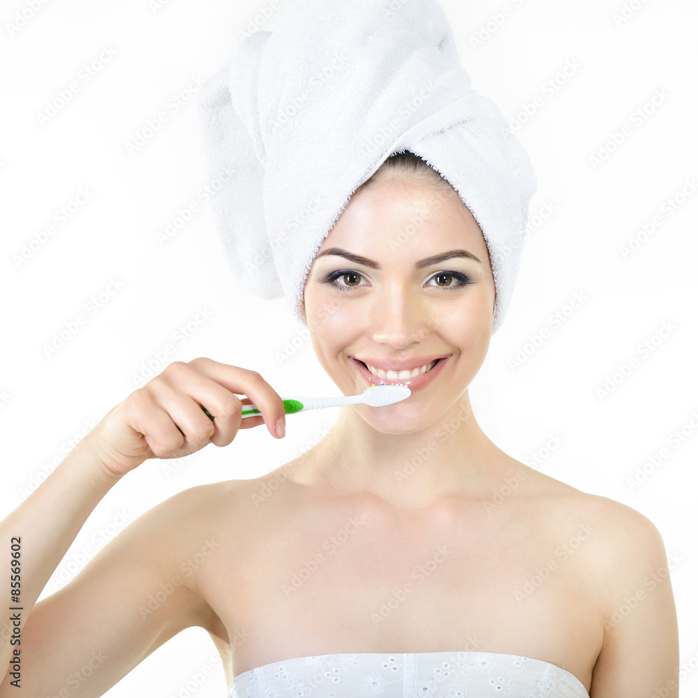 Young fresh cheerful woman with tooth-brush and bath towel over Young fresh cheerful woman with tooth-brush and bath towel over