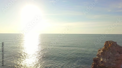 Sunrise Over Water Cliffs Rocks Aerial Vacation Travel Concept photo